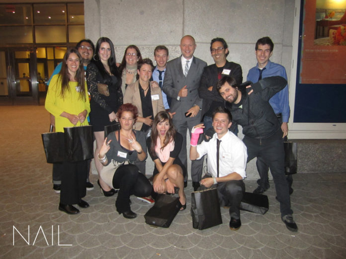 ‘NAILING’ THE AWARD: Jeremy Crisp, center in gray suit, managing partner, and Brian Gross, at Crisp’s left, creative partner, were among team members celebrating Nail’s 2012 Francis W. Hatch Award for Creative Excellence in New England Advertising. / COURTESY NAIL COMMUNICATIONS ‘NAILING’ THE AWARD: Jeremy Crisp, center in gray suit, managing partner, and Brian Gross, at Crisp’s left, creative partner, were among team members celebrating Nail’s 2012 Francis W. Hatch Award for Creative Excellence in New England Advertising. / COURTESY NAIL COMMUNICATIONS