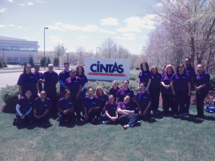 A HEALTHY WALK: Cintas employees get ready for their annual participation in the Relay for Life walk to benefit the American Cancer Society. / COURTESY CINTAS