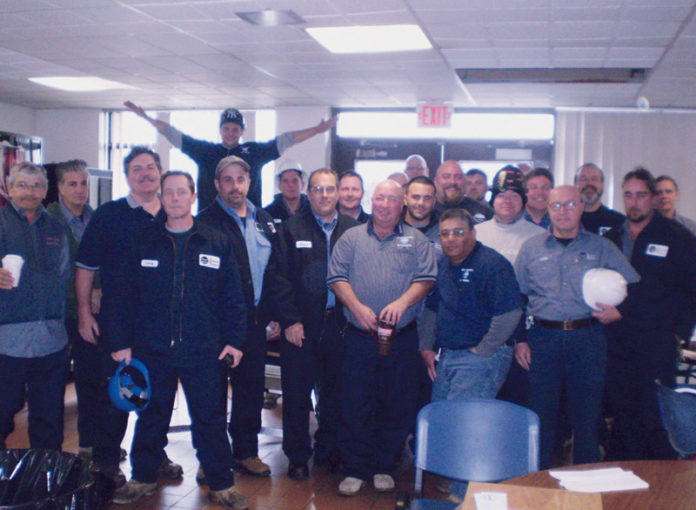 RAIN OR SHINE: Staff members at the Narragansett Bay Commission&rsquo;s Field&rsquo;s Point wastewater-treatment facility received special recognition for going above and beyond the call of duty in response to Hurricane Sandy. / COURTESY NARRAGANSETT BAY COMMISSION