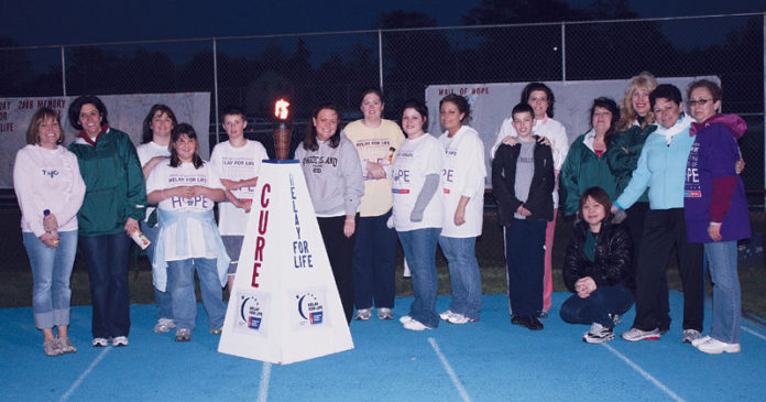 WALK THE TALK: People’s Credit Union encourages employees to give back to the community through a monthly newsletter that lists charitable events, such as the American Cancer Society’s Relay for Life Walk. / COURTESY PEOPLE’S CREDIT UNION WALK THE TALK: People’s Credit Union encourages employees to give back to the community through a monthly newsletter that lists charitable events, such as the American Cancer Society’s Relay for Life Walk. / COURTESY PEOPLE’S CREDIT UNION
