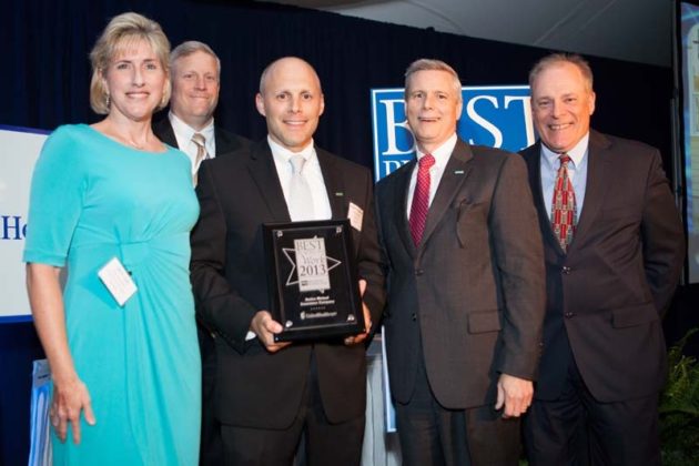 Jill Andy, Sam Palmisano and Robert DiMuccio, Amica, accept their First Place Award (enterprise category) / Rupert Whiteley