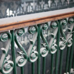 ROUGHLY 20,000 stars decorate the original railings around the second- and third-floor landings. / PBN PHOTOS/TRACY JENKINS