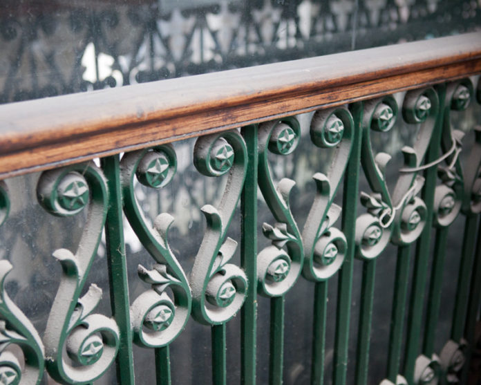 ROUGHLY 20,000 stars decorate the original railings around the second- and third-floor landings. / PBN PHOTOS/TRACY JENKINS