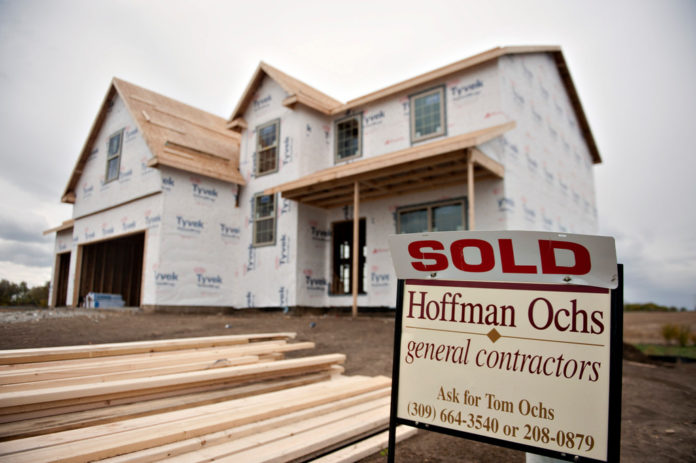 SALES OF NEW homes in the U.S. climbed more than forecasting in June, rising to the highest level in five years.  / BLOOMBERG FILE PHOTO/DANIEL ACKER