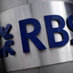 MOODY'S INVESTORS SERVICES has put Royal Bank of Scotland Group PLC on review for a downgrade as the British government considers a breakup of the bailed-out lender.  / BLOOMBERG FILE PHOTO/MATTHEW LLOYD