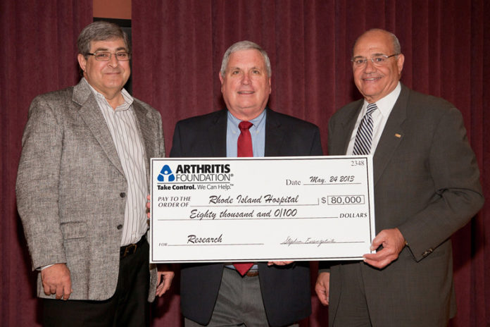 THE ARTHRITIS FOUNDATION made a grant of $80,000 to Rhode Island Hospital in support of research and treatment. From left, Peter Vican, regional board member, Arthritis Foundation, New England; Dr. Edward “Ted” Lally, director, Division of Rheumatology, Rhode Island Hospital; Stephen Evangelista, CEO, Arthritis Foundation New England Region.