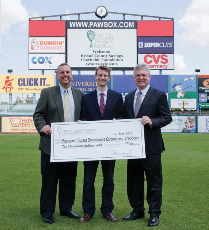 CHARITY AT HOME: Bristol County Savings Charitable Foundation presents a $10,000 grant to Pawtucket Citizens Development Corp. From left: Pawtucket Mayor Donald R. Grebien; Andrew Pierson, housing-development associate at Pawtucket Citizens Development Corp.; Patrick J. Murray, Jr. president of the Bristol County Savings Charitable Foundation and president and CEO of Bristol County Savings Bank.