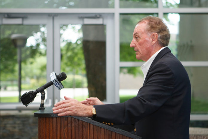 AT A PRESS CONFERENCE ON SUNDAY, Bryant University President Ronald K. Machtley urged Gov. Lincoln D. Chafee to issue a gubernatorial veto to the bill the General Assembly passed last week that altered Bryant's tax-exempt status. / COURTESY ROCKARHO MEDIA GROUP INC./VICTORIA AROCHO
