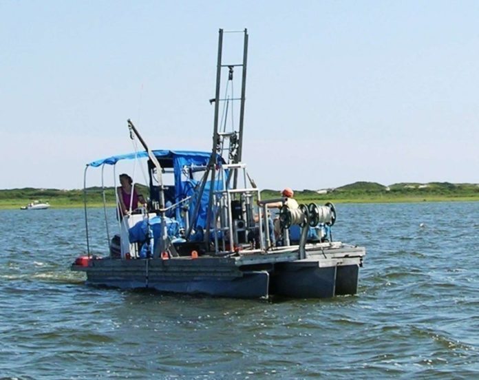 WHAT LIES BENEATH: A coring barge used in a URI Graduate School of Oceanography initiative exploring submerged ancient landscapes. / COURTESY URI