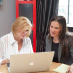 TAKING A GAMBLE: Gail Morris, left, and Stacey Liakos are managing partners at Omnia Agency, the Providence advertising firm the two founded in 2008. The full-service agency specializes in media buying, website development and graphic design. / PBN PHOTO/TRACY JENKINS