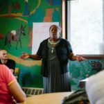 OPPORTUNITY KNOCKS: Stephanie Jones-Pringle, a financial coach for Amos House, speaks at the nonprofit&rsquo;s Financial Opportunity Center. / PBN PHOTO/RUPERT WHITELEY