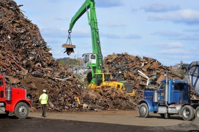 RHODE ISLAND ranks 10th in the nation for the value of its scrap and recycled materials exports, according to statistics released by the Business Roundtable Tuesday. Pictured is the Sims Metal Management operation at the former location of Promet Marine Services along the Providence's Allens Avenue waterfront. / PBN FILE PHOTO/FRANK MULLIN