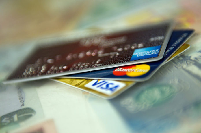 CREDIT CARD DEBT increased more in Rhode Island than any other state in the second quarter of 2013. / BLOOMBERG FILE PHOTO/DAVID PAUL MORRIS