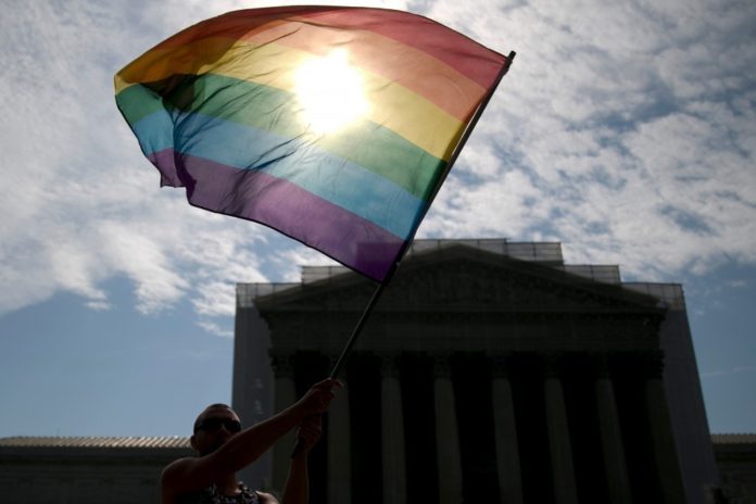 GAY MARRIAGE LAWS could spur gay couples to move and attract businesses to states where same-sex marriage is legal. / BLOOMBERG FILE PHOTO/ANDREW HARRER