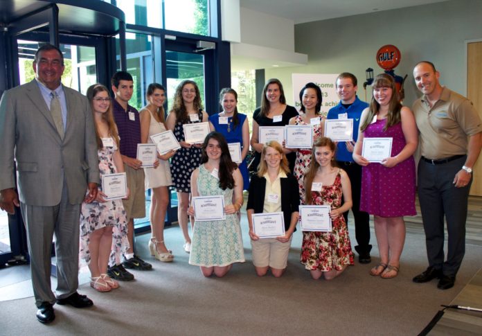 CUMBERLAND FARMS OFFICIALS present scholarships to some of this year's Believe and Achieve scholarship winners, including Jennifer Kosteer and Madeleine Fournier of Rhode Island. / COURTESY CUMBERLAND FARMS CUMBERLAND FARMS OFFICIALS present scholarships to some of this year's Believe and Achieve scholarship winners, including Jennifer Kosteer and Madeleine Fournier of Rhode Island. / COURTESY CUMBERLAND FARMS