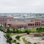 THE INTERSTATE 195 REDEVELOPMENT DISTRICT COMMISSION is considering supporting a citizen-backed plan to bury the power lines leading from Providence's Manchester Street Power Station (in background) to East Providence, thus removing them from India Point Park. / PBN FILE PHOTO/NATALJA KENT
