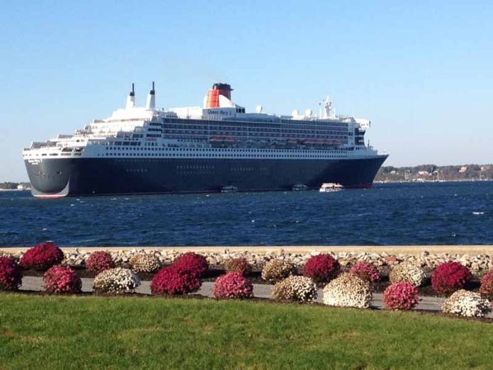 CRUISING ALONG: The Queen Mary 2, pictured off Goat Island in October 2012, is back in Newport through the end of October. / COURTESY DISCOVER NEWPORT