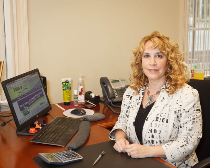 NEW WAVE: Pier-Mari Toledo, director of mortgage lending at Wave Federal Credit Union, says certain credit union insurances make it less “scary for us as a lender to be exposed at 100 percent.” / PBN PHOTO/TRACY JENKINS