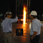 BURN NOTICE: FM Global senior research specialists Yi Wang, left, and Karl Meredith observe a controlled fire at the insurer&rsquo;s Glocester test facility. / PBN PHOTO/BRIAN MCDONALD