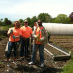 SET THE DATE: Embrace Home Loans employees, from left, Claudia Mobilia,  Joe Muscarella and Mike Manley volunteered at Methodist Community Gardens as part of the company&rsquo;s 30th anniversary day. / COURTESY EMBRACE HOME LOANS