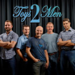 Band, races seen helping boost morale of employees IMAGE COURTESY HASBRO
HIGH NOTE: Hasbro’s Toys2Men band is, left to right, Tom Sargent, Dan Sanfilippo, Corey Martineau, Barry Farrands and James D’Aloisio.