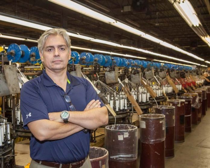 SWIFT ACTION: Fred Nunes, vice president and general manager of Rhode Island Textile Co., has joined the shoemaker in lobbying Congress to amend the procurement law so soldiers’ sneakers must be 100 percent U.S. made. / PBN PHOTO/TRACY JENKINS