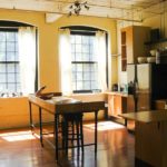 WORK SPACE: One of the six 2,000-square-foot live-work spaces at Archers Mill in Central Falls, the first property purchased. / COURTESY KYLA COBURN DESIGNS