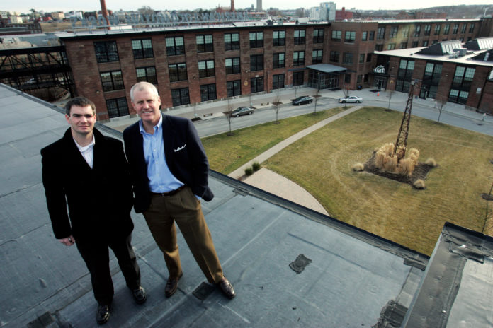 PEREGRINE PROPERTY MANAGEMENT principals Jeff Spratt, left, and Brendan Kane were photographed when they were named managers of the ALCO development in 2010. They will be retained by the new owners of the complex, Foundry Associates L.P. / PBN FILE PHOTO/MATTHEW HEALEY