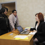 DEVELOPING STORY: Adriana Dawson, R.I. Small Business Development Center director, middle, speaks with with Operations Director Diane Fournaris, left, and Central and Southern Rhode Island Director Ardena Lee-Fleming at the center&rsquo;s JWU home. URI has made a bid to host the center starting next year. / PBN PHOTO/MARTIN GAVIN