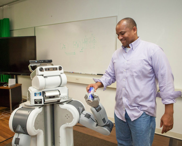 TIME TO GROW: Chad Jenkins, an associate professor of computer services at Brown University, researched public access to robotics through the Internet on his sabbatical. / PBN PHOTO/TRACY JENKINS