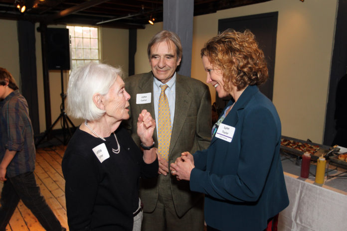 PHILANTHROPISTS LETITIA (left) and John Carter (center) talk with 2013 Rhode Island Innovation Fellowship recipient Lynn Taylor, who will receive up to $300,000 for her proposal to eradicate Hepatitis C in Rhode Island. The Rhode Island Foundation announced Tuesday that it has begun accepting applications for the 2014 awards, which will award two applicants up to $300,000 over three years to develop solutions to the state's challenges. / COURTESY THE RHODE ISLAND FOUNDATION