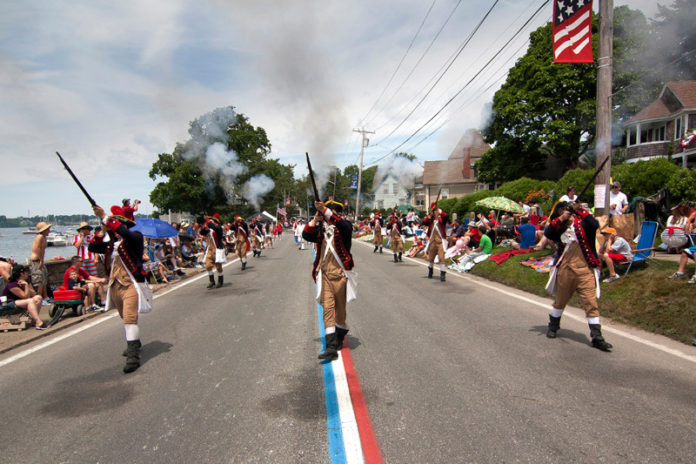 SHOWING PRIDE: The Bristol Train of Artillery commanded by Lt. Col. Raymond Murray performs during the 2011 Fourth of July Parade. The Bristol Merchants Association and residents have launched a marketing campaign to pitch the town’s assets. / COURTESY ED KING