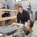 DYNAMIC RESULTS: Christian Rijos, 15, a student at the Metropolitan Regional Career and Technical Center in Providence, has participated in Center for Dynamic Learning classes and hopes to pursue a long-term career in manufacturing. / PBN PHOTO/TRACY JENKINS