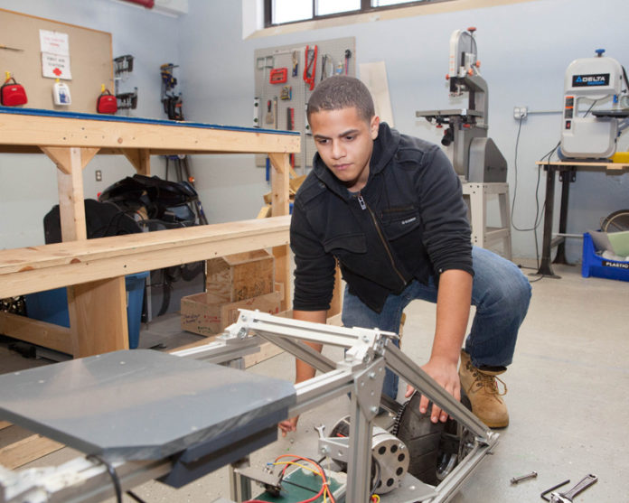 DYNAMIC RESULTS: Christian Rijos, 15, a student at the Metropolitan Regional Career and Technical Center in Providence, has participated in Center for Dynamic Learning classes and hopes to pursue a long-term career in manufacturing. / PBN PHOTO/TRACY JENKINS