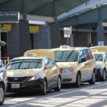 MAKING CONNECTIONS:  Taxis line up at T.F. Green Airport waiting for disembarking passengers, a consistent stream of business. / PBN PHOTO/MARK S. MURPHY