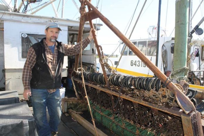 TAKES GUTS: Michael Marchetti, executive director of the Rhode Island-based Commercial Fisheries Research Foundation, sees potential profits in scallop viscera. / COURTESY JOHN LEE