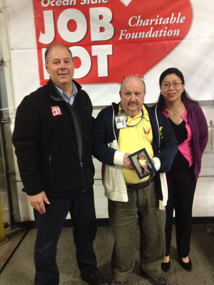 FROM LEFT: David Sarlitto, head of marketing for Ocean State Job Lot; Dan Aurelio holding a picture of his wife and daughter; and Kerstin Uy-Berja, a Johnston resident, representing His Presence Church International in Woonsocket. / COURTESY OCEAN STATE JOB LOT