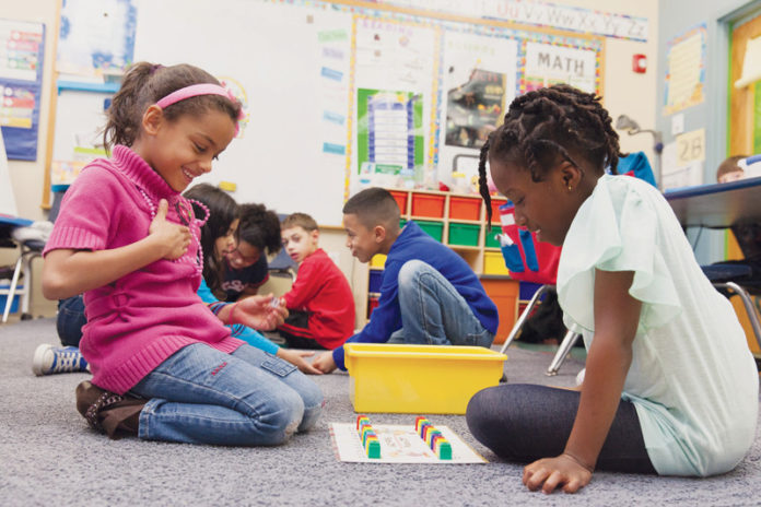 MORE THAN CHILD’S PLAY: Highlander Charter School has shown strong success with its students, so much so that the R.I. Department of Education not only extended its charter but is allowing the school to extend its programs to pre-kindergarten and high school. / PBN PHOTO/DAVID LEVESQUE