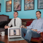 TALKING SHOP: Ely Beckman, left, principal founder of Reckoner Group, with Ethan Tucker, owner of Mobile Life Inc. Beckman and Tucker have been working together, meeting at Angelina&rsquo;s Coffee Shop in Bristol. / PBN PHOTO/TRACY JENKINS