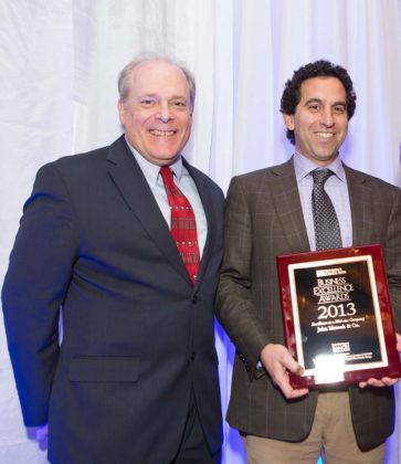George Matouk Jr. accepts his award for Excellence at a Mid-Size Company / Rupert Whiteley
