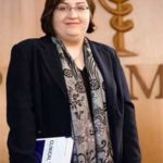 DR. FATEMEH AKHLAGHI, a University of Rhode Island professor of biomedical and pharmaceutical sciences, has received $1.65 million from the National Institutes of Health to study a new treatment for alcoholism in collaboration with Dr. Lorenzo Leggio of the National Institute on Alcohol Abuse and Alcoholism. / COURTESY UNIVERSITY OF RHODE ISLAND