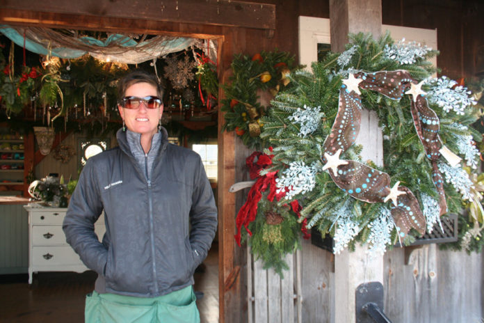 TREES FOR THE FOREST: Sue Champagne, artistic director at The Farmer’s Daughter, said sales have “been going well this early season,” but added that “it’s all weather-dependent.” / PBN PHOTO/HAROLD AMBLER