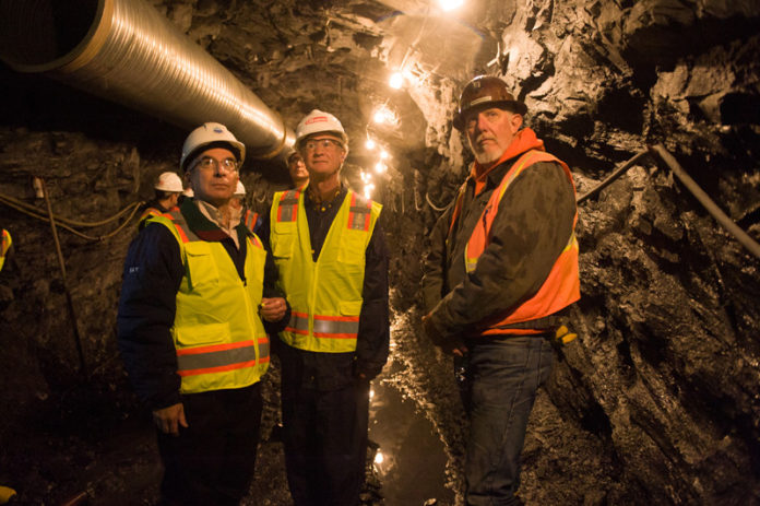 WHAT LIES BENEATH: Gov. Lincoln D. Chafee, center, surveys a tunnel that captures sewage overflow, with Narragansett Bay Commission Executive Director Ray Marshall, left, and Scott Early lead inspector at Gilbane-Jacobs. / COURTESY PETER GOLDBERG