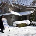 November sees home sale slowdown but prices continue rise THE MEDIAN SALE PRICE of a single-family home in Rhode Island increased for the 14th consecutive month in November, according to the Rhode Island Association of Realtor, despite a year-over-year drop in the number of homes sold. / BLOOMBERG NEWS FILE PHOTO/DAVID CALVERT