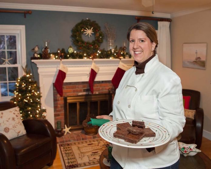 COOKING SOMETHING GOOD: Kathleen Seguin opened Bristol House Bed & Breakfast in May 2011. In the past year she’s added another role: board member at Discover Newport. / PBN PHOTO/TRACY JENKINS