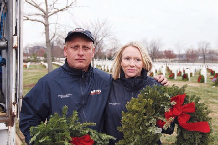 STEVEN MEYER and his wife Angie helped unload and place the wreaths at gravestones with the aid of active members of the Armed Forces, veterans, families and community volunteers during “Wreaths Across America Day.”