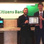 Van Saun supports<br>
CGF’s nonprofit IPO FOUNDER AND EXECUTIVE DIRECTOR of the Capital Good Fund Andy Posner, left, presents a stock certificate for Social Innovation Shares to support the nonprofit IPO, in this case Immediate Public Opportunity, to RBS Citizens Financial Group Chairman and CEO Bruce Van Saun.