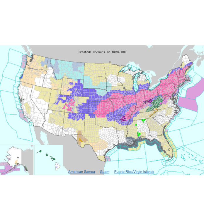 THE NATIONAL WEATHER SERVICE issued a winter storm warning on Tuesday for heavy snow, freezing rain and ice accumulation stretching across the U.S. Midwest and into the Northeast. In the map above, pink represents areas under a National Weather Service winter storm warning, while purple represents areas under a winter weather advisory. / COURTESY NATIONAL WEATHER SERVICE