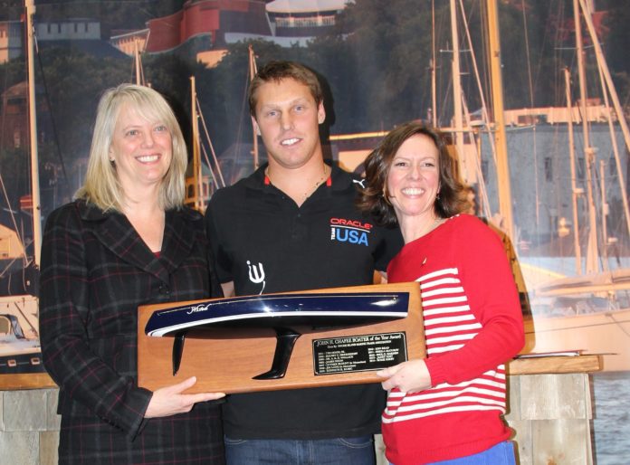 ROME KIRBY, a native Rhode Islander who was a member of the winning America's Cup crew, Oracle Team US, was crowned the John H. Chafee 2014 Boater of the Year by the Rhode Island Marine Trades Association during the Providence Boat Show. Rhode Island Department of Environmental Management Director Janet Coit, left, the 2013 Boater of the Year, presented the award to Kirby. Also pictured is Wendy Mackie, right, CEO of RIMTA. / COURTESY JOE ANDRADE