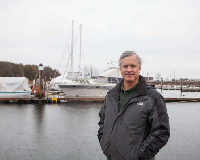 STORM COMING? Jim Shriner, Mill Creek Marine owner, said climate change warnings are causing small-business owners to incur “exorbitant costs” for insurance. / PBN PHOTO/TRACY JENKINS